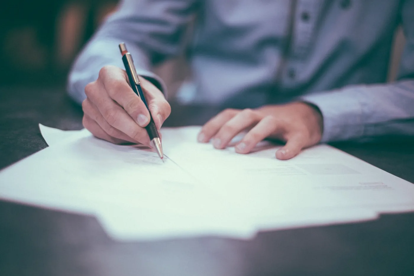 Tax documents and forms reviewed during a client consultation