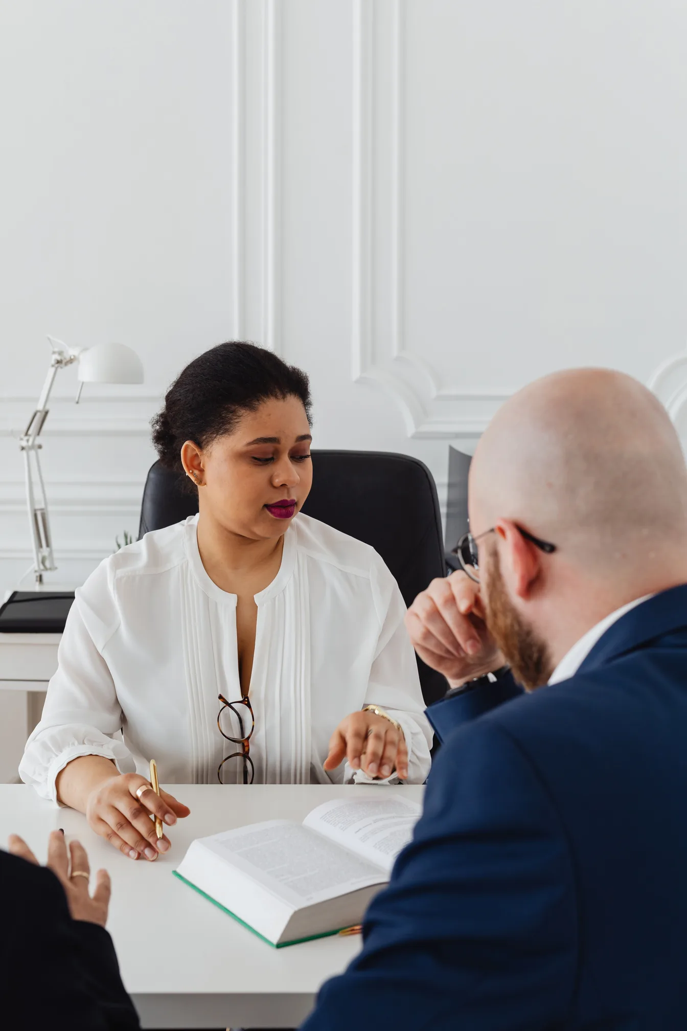 Kemi Olobade, Lead Accountant at Lakingz Services, consulting with a client